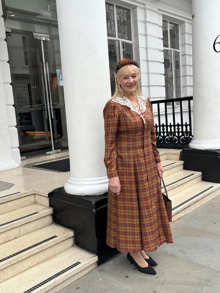 Marion Foster MBE in the dress she made for the Women of the Year Lunch, in Muted Strathearn silk with a Victorian lace collar